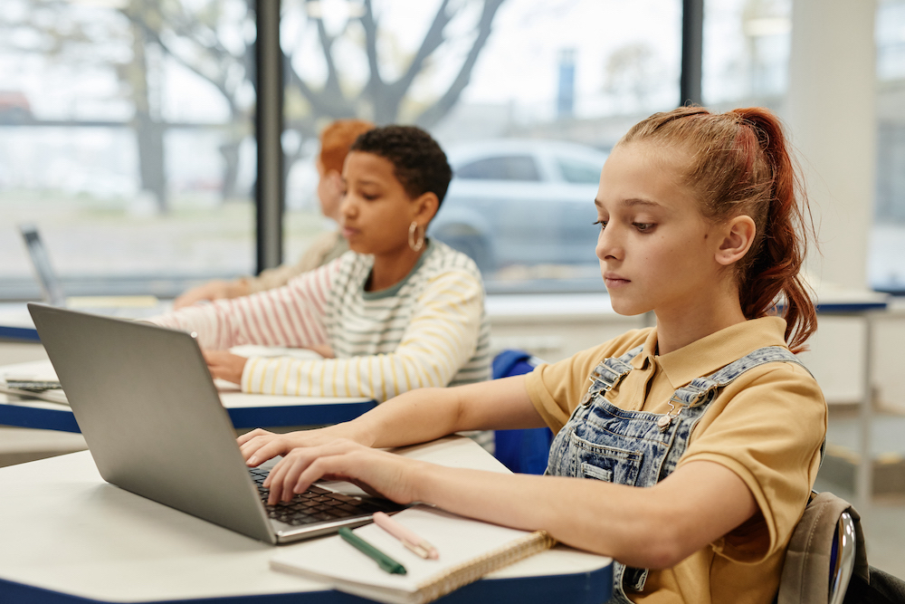 Kids Using Laptops in Class