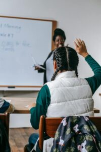 School student raising hand